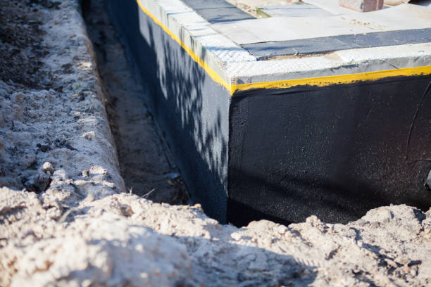 Professional Exterior Waterproofing technician working in Monticello, KY